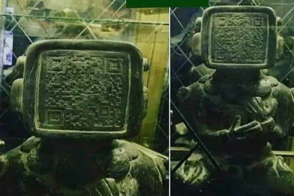 There is a QR code on the front of an ancient Mayan statue. | Iuve